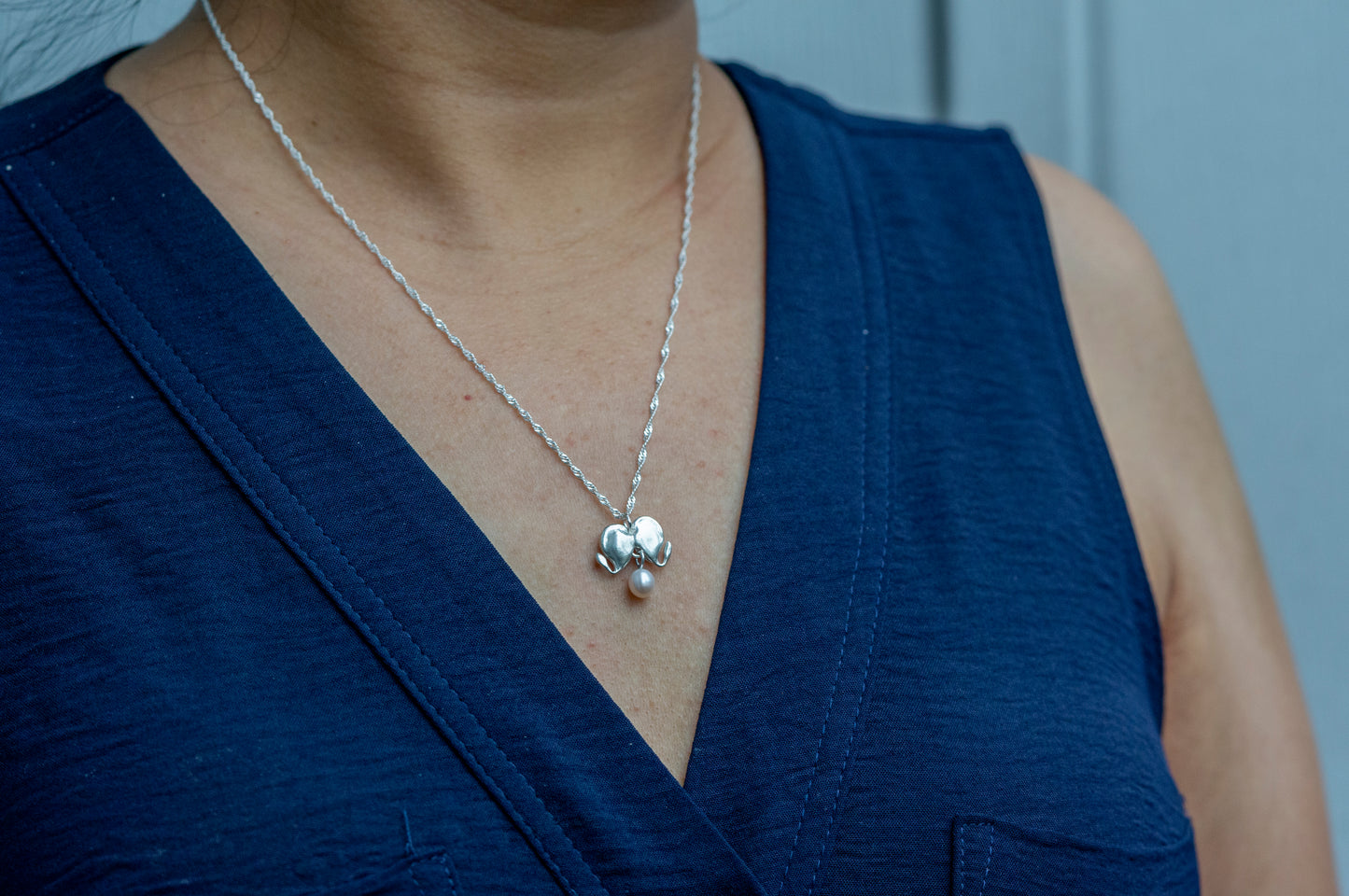 Bleeding heart sterling silver necklace