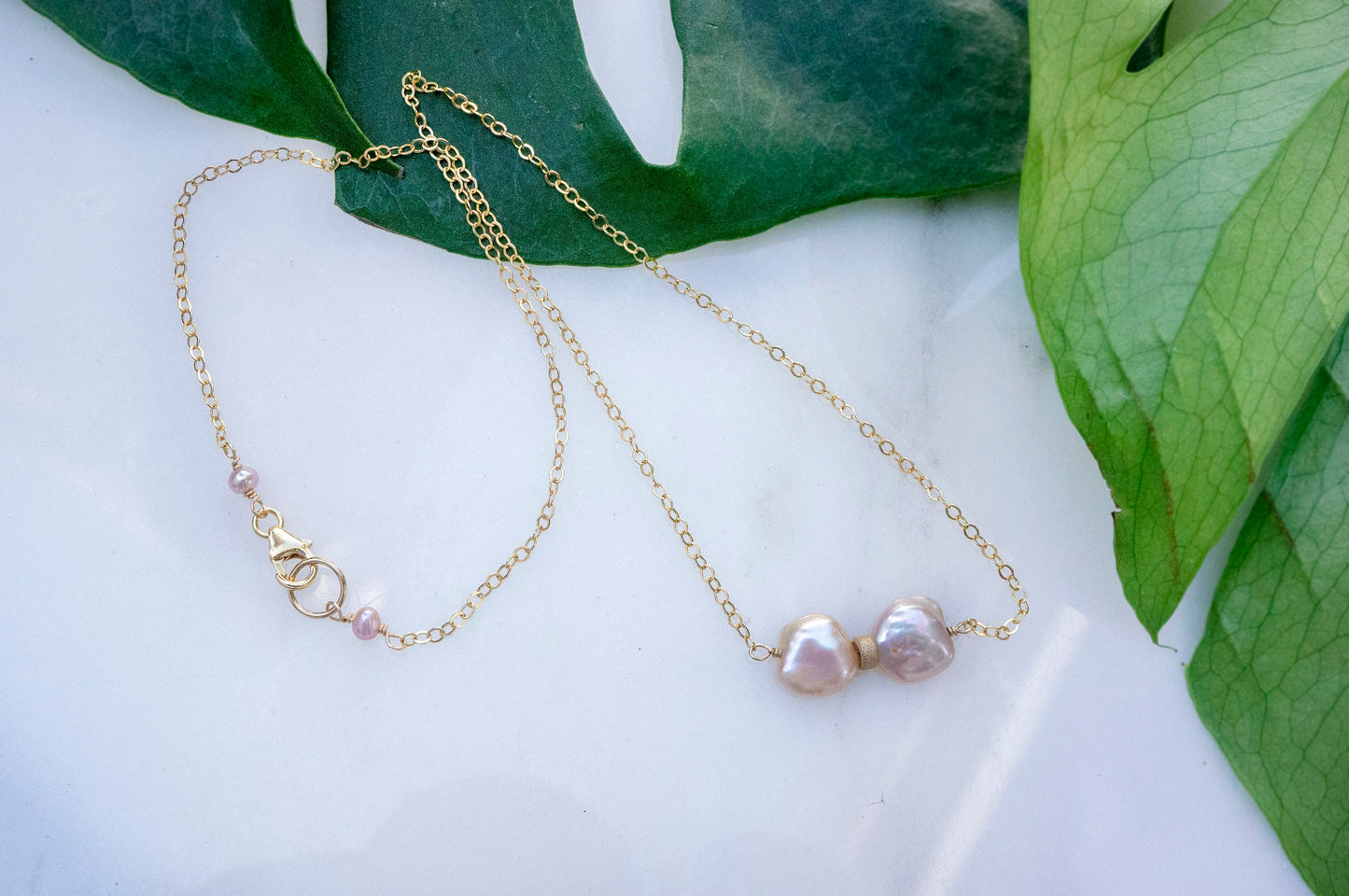 Bowtie petal pearl necklace