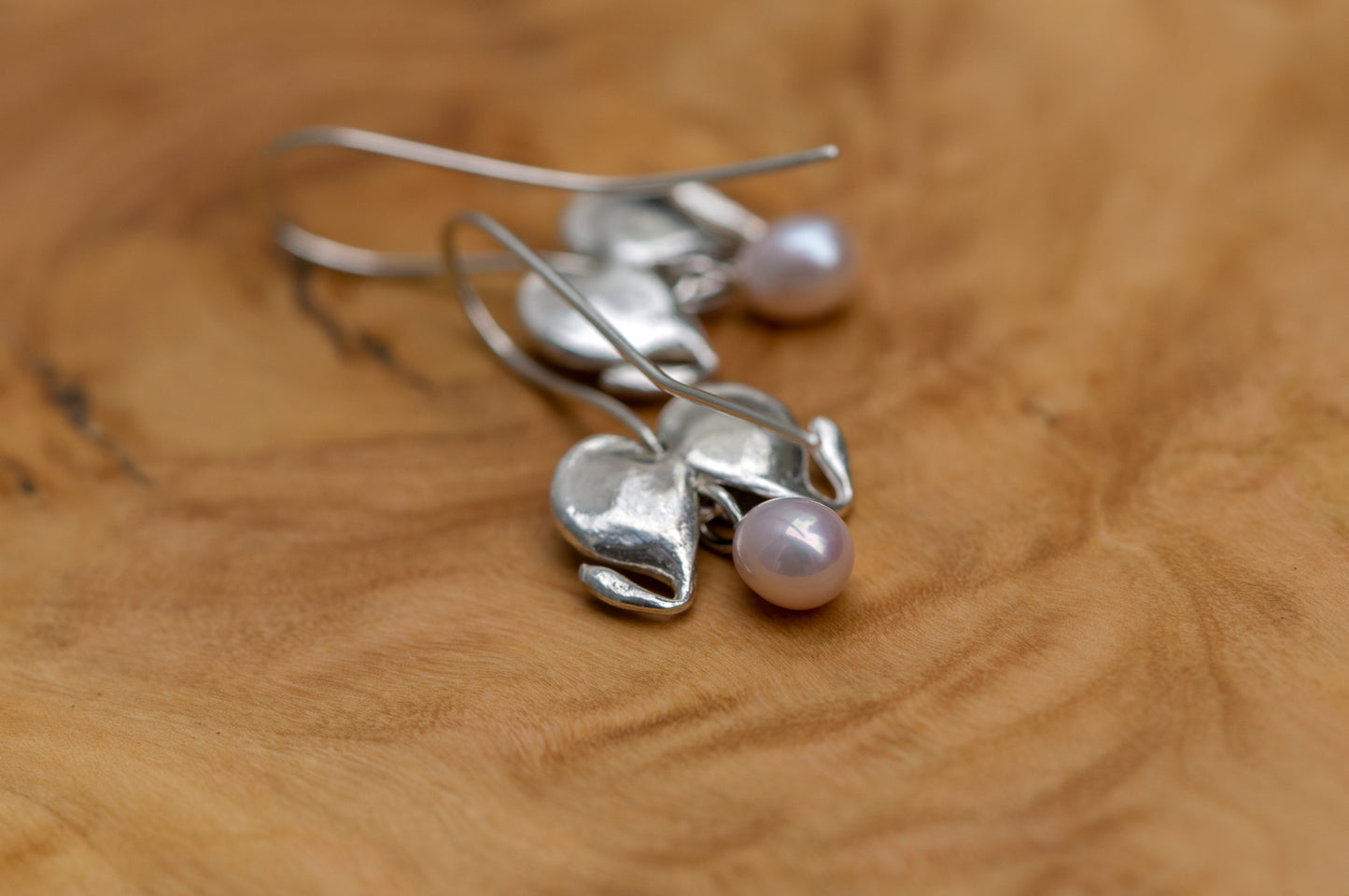 Bleeding heart silver dangle earrings