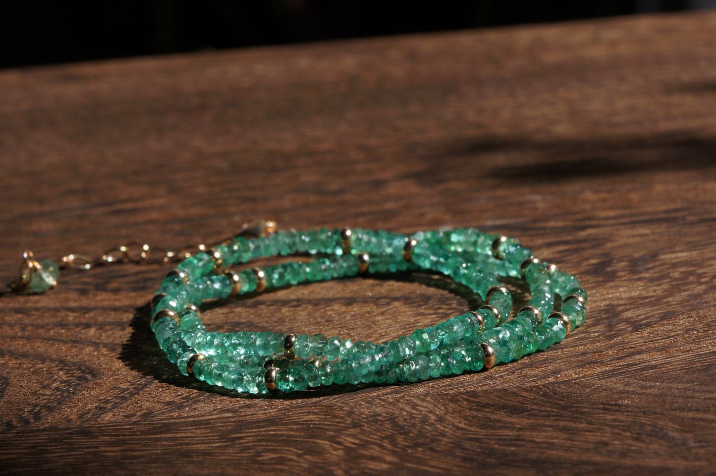 Emerald and gold bead necklace