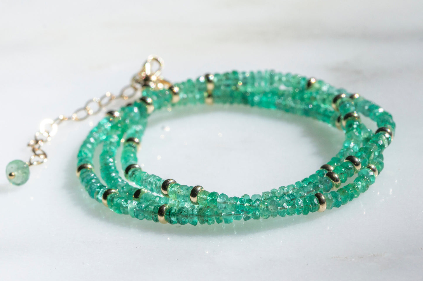 Emerald and gold bead necklace