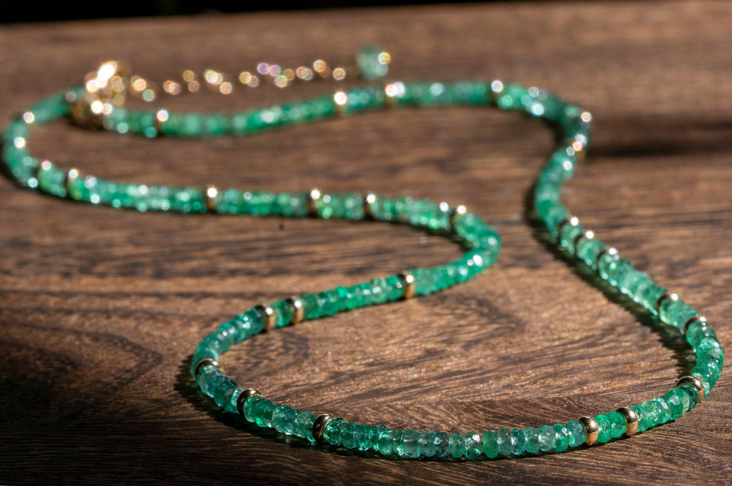 Emerald and gold bead necklace