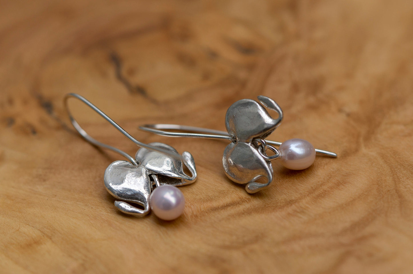 Bleeding heart silver dangle earrings