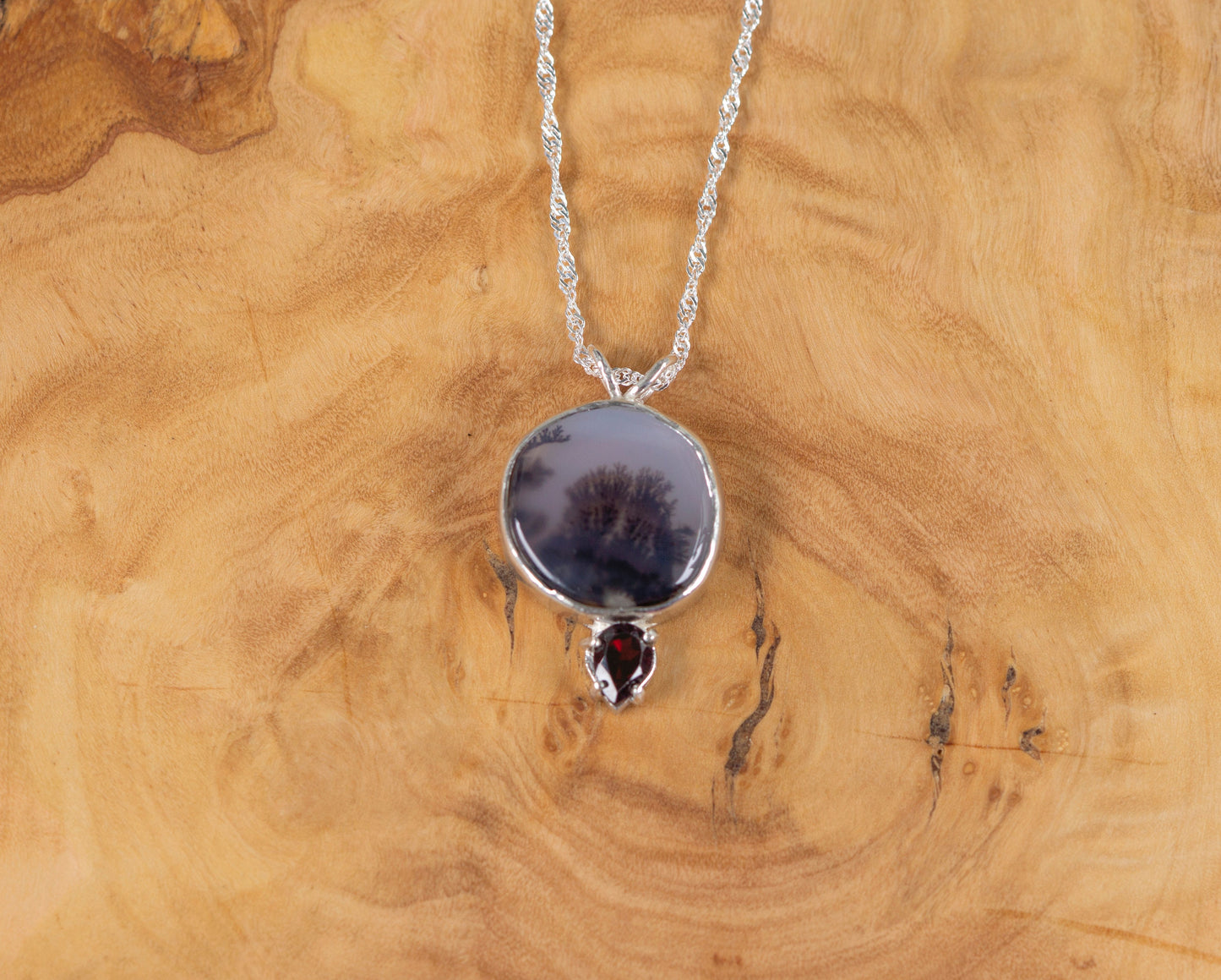 Dendritic agate and garnet silver pendant