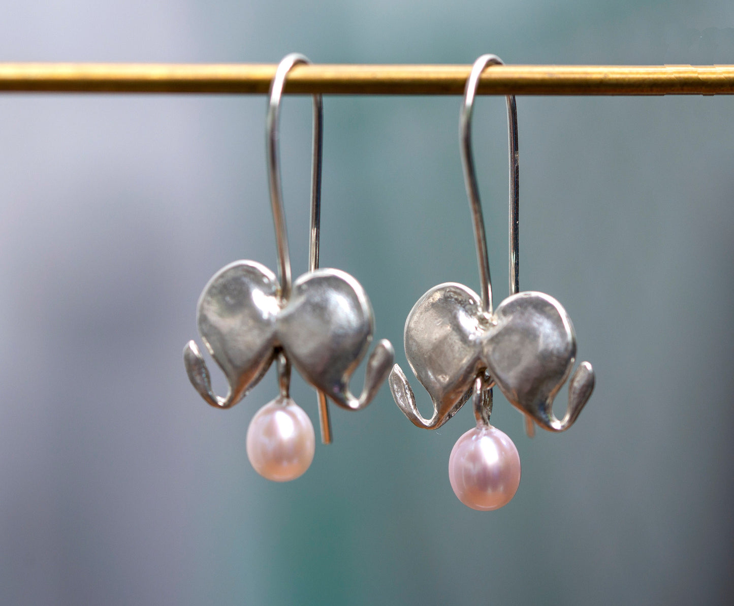 Bleeding heart silver dangle earrings