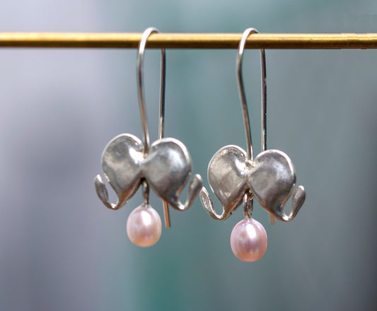 Bleeding heart silver dangle earrings