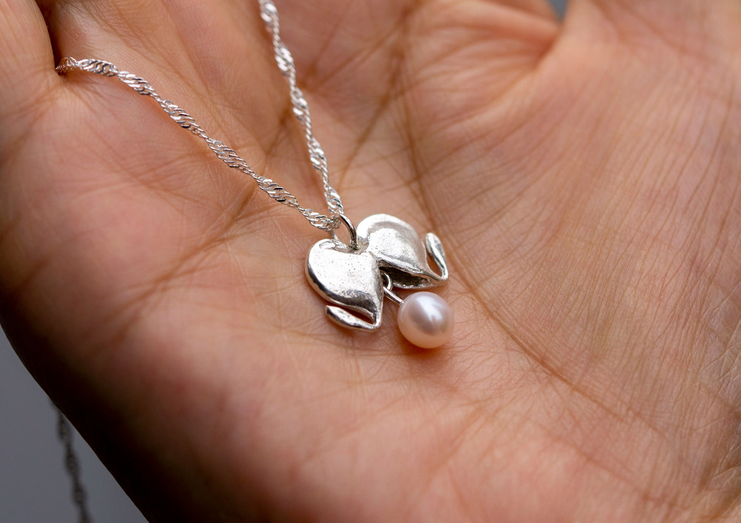 Bleeding heart sterling silver necklace