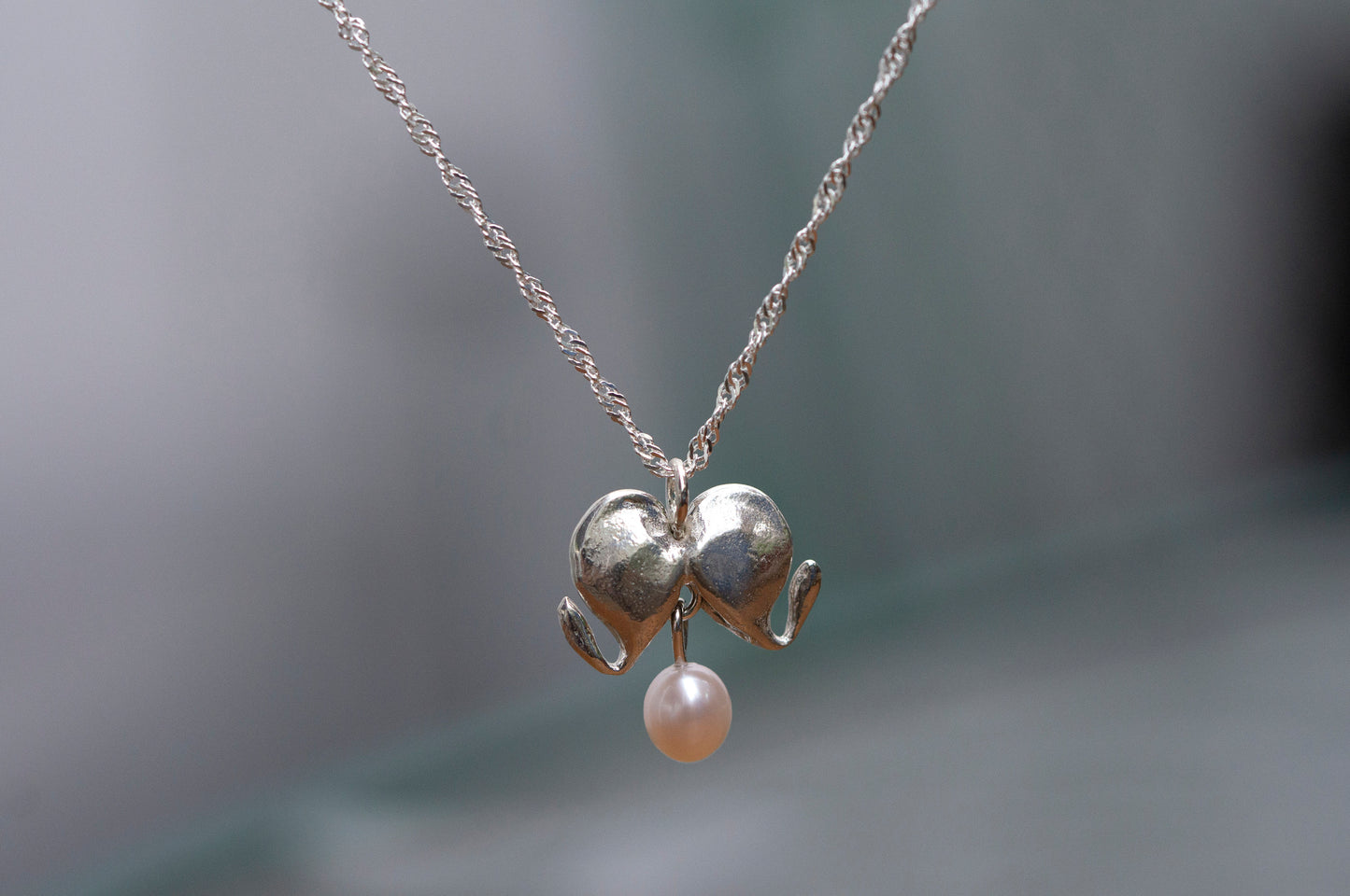 Bleeding heart sterling silver necklace