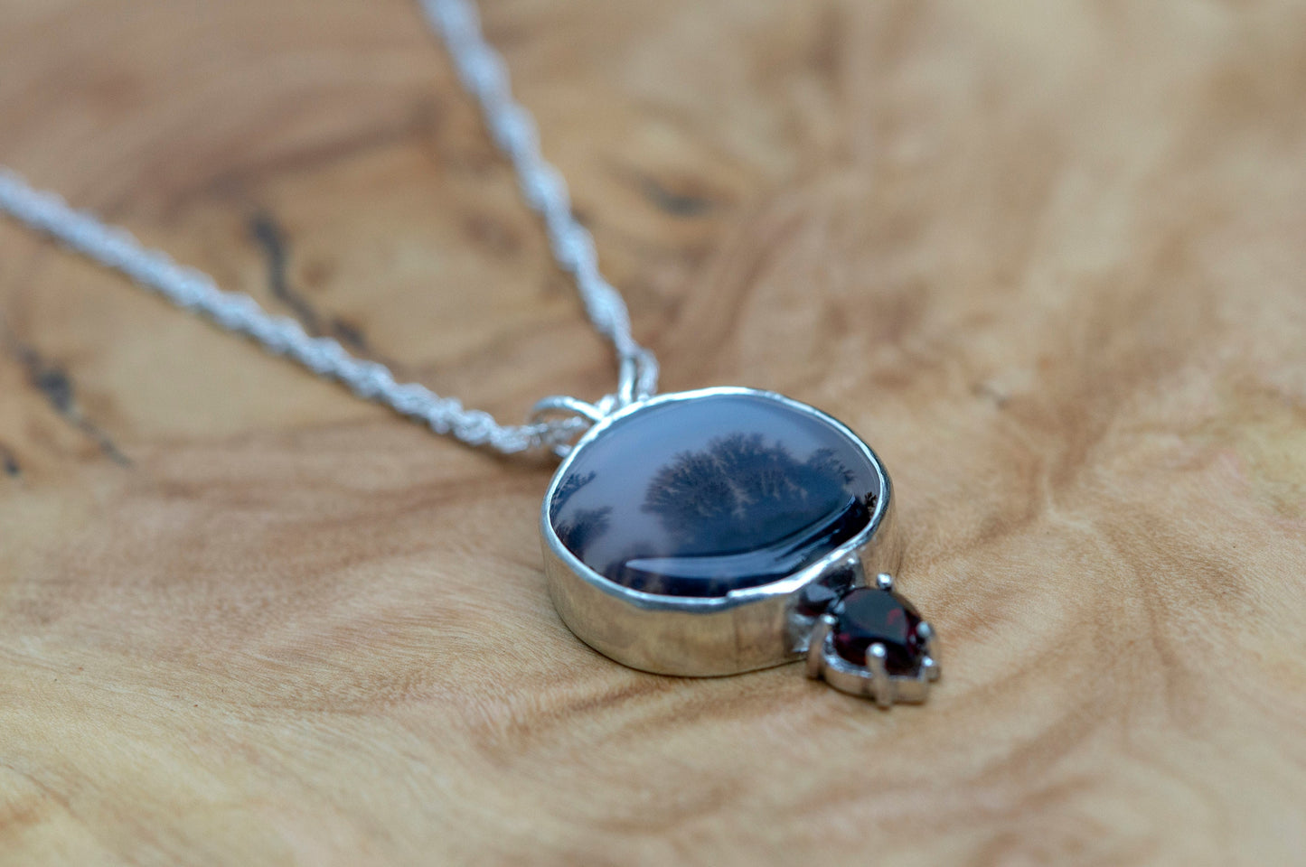 Dendritic agate and garnet silver pendant