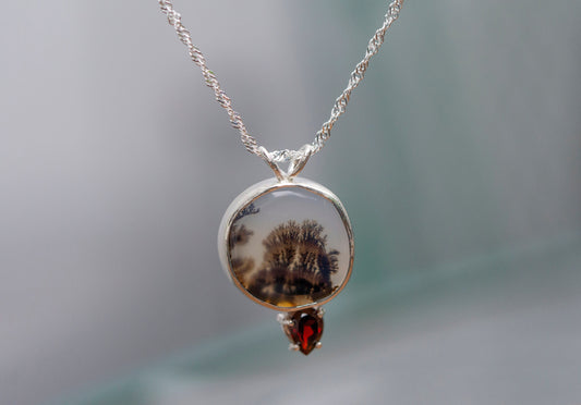 Dendritic agate and garnet silver pendant