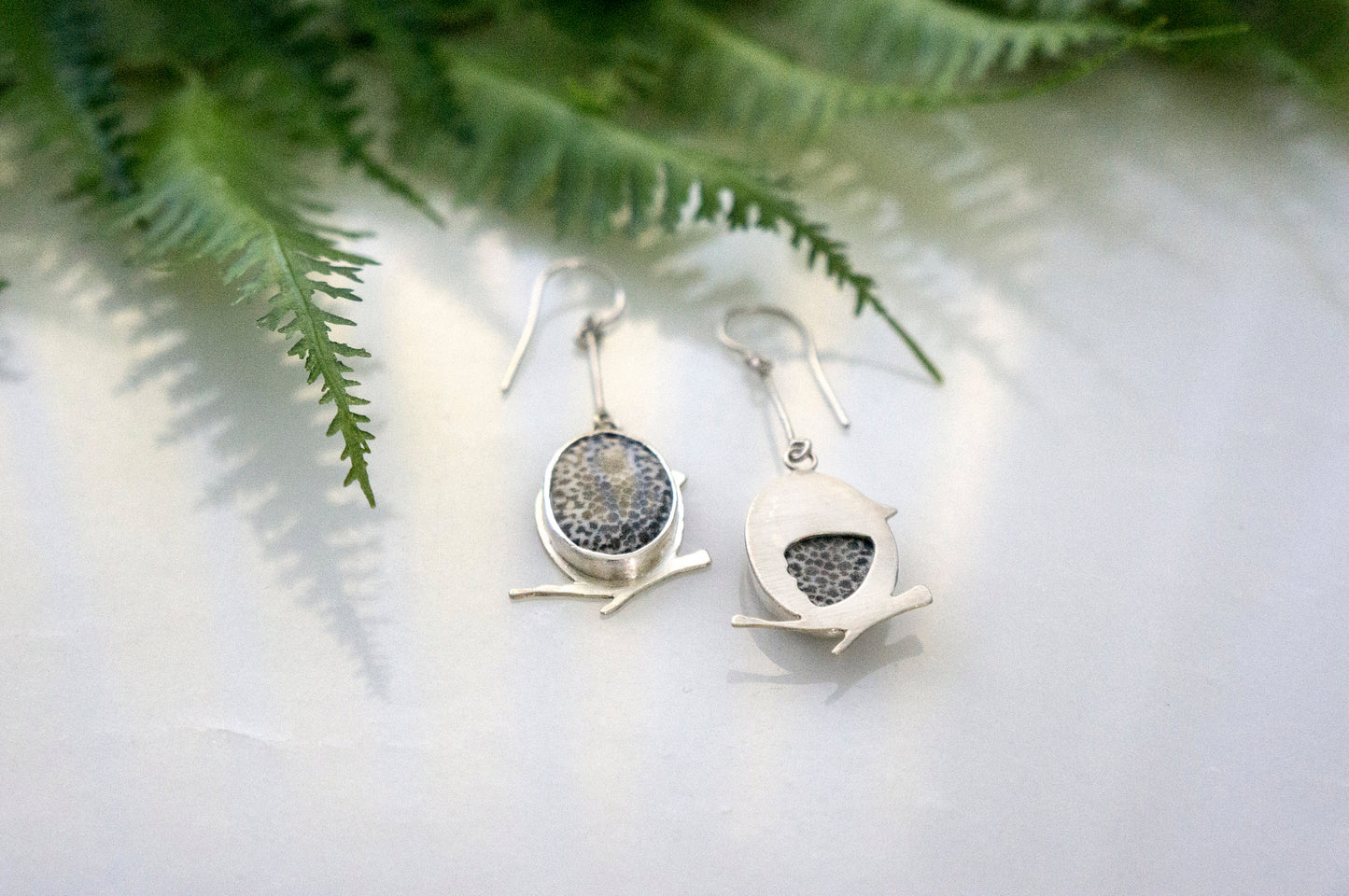 Black fossil coral little bird earrings