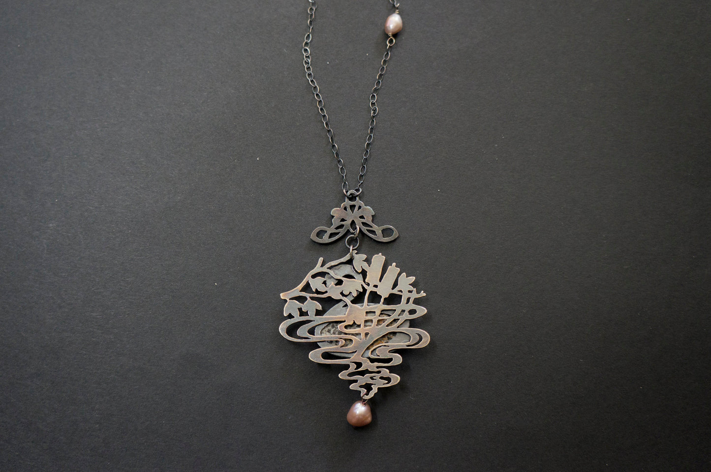 Swan black fossil coral and baroque pearl sterling silver necklace