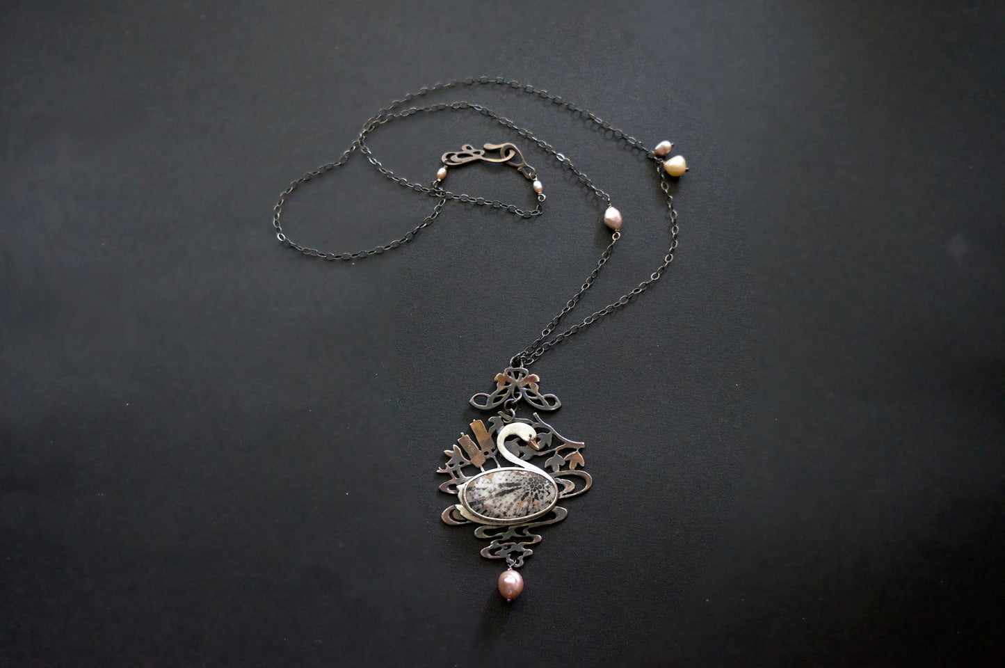 Swan black fossil coral and baroque pearl sterling silver necklace