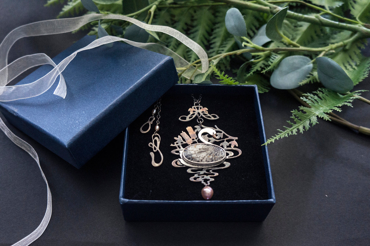 Swan black fossil coral and baroque pearl sterling silver necklace