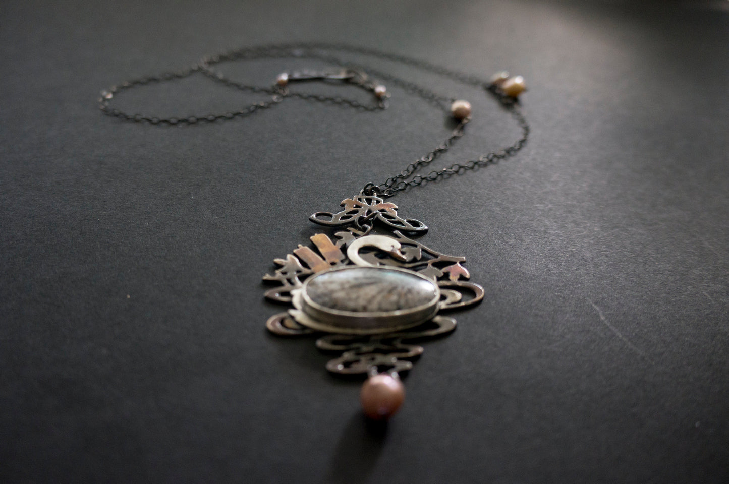 Swan black fossil coral and baroque pearl sterling silver necklace