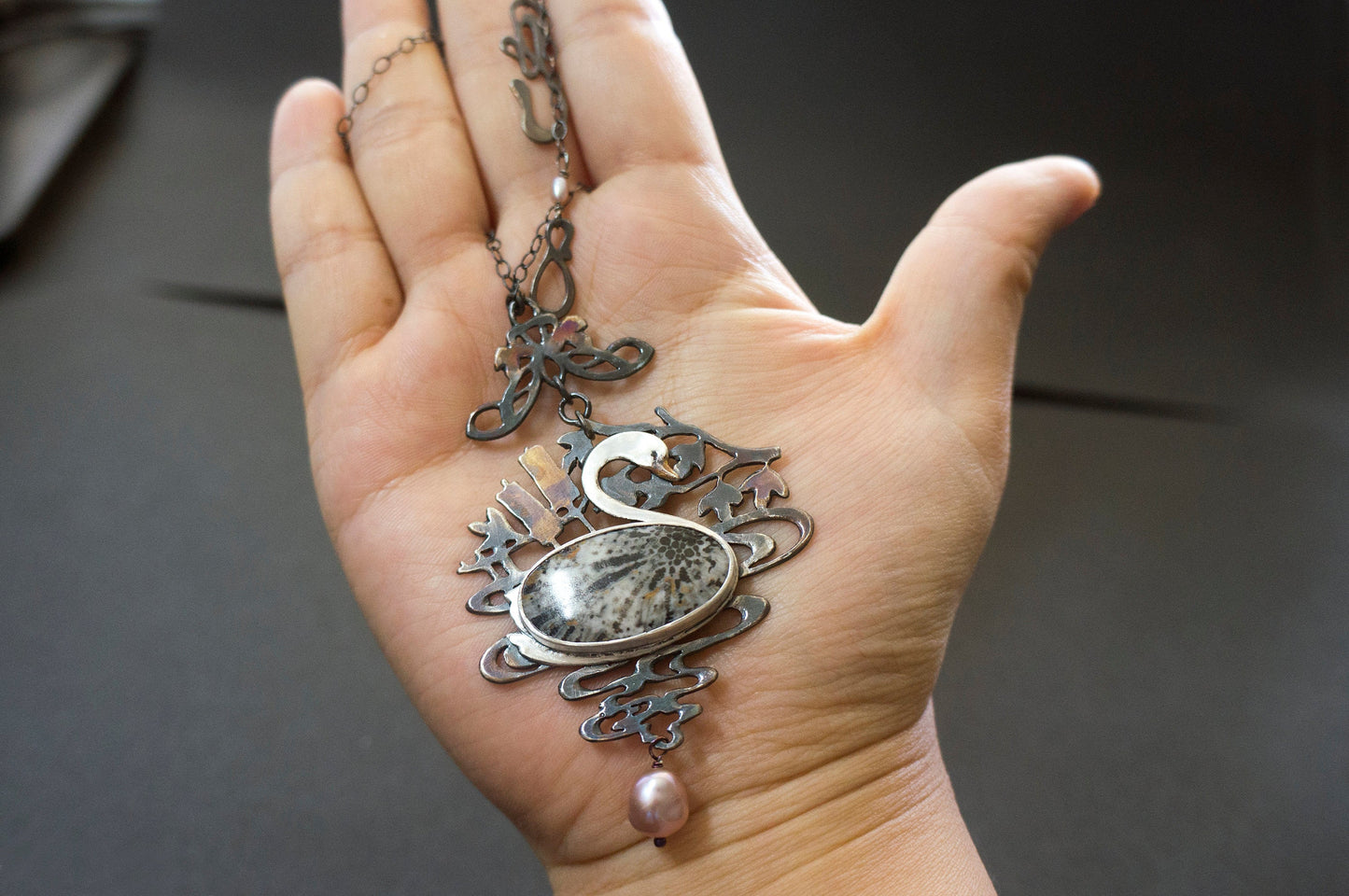 Swan black fossil coral and baroque pearl sterling silver necklace