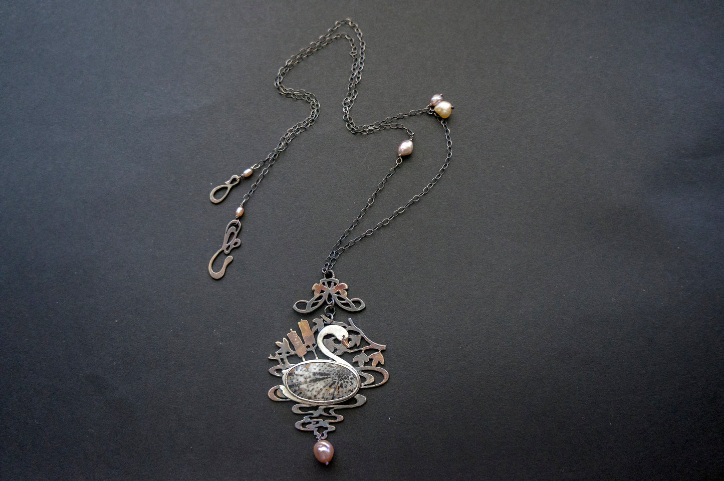 Swan black fossil coral and baroque pearl sterling silver necklace