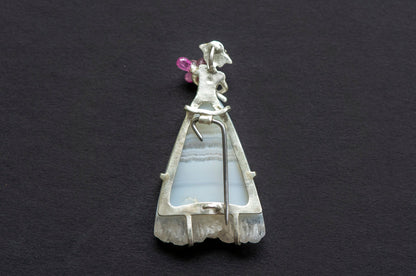 Lady with bouquet brooch and necklace