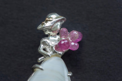 Lady with bouquet brooch and necklace