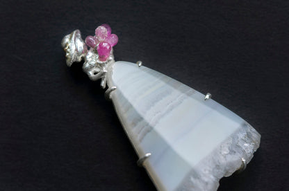 Lady with bouquet brooch and necklace
