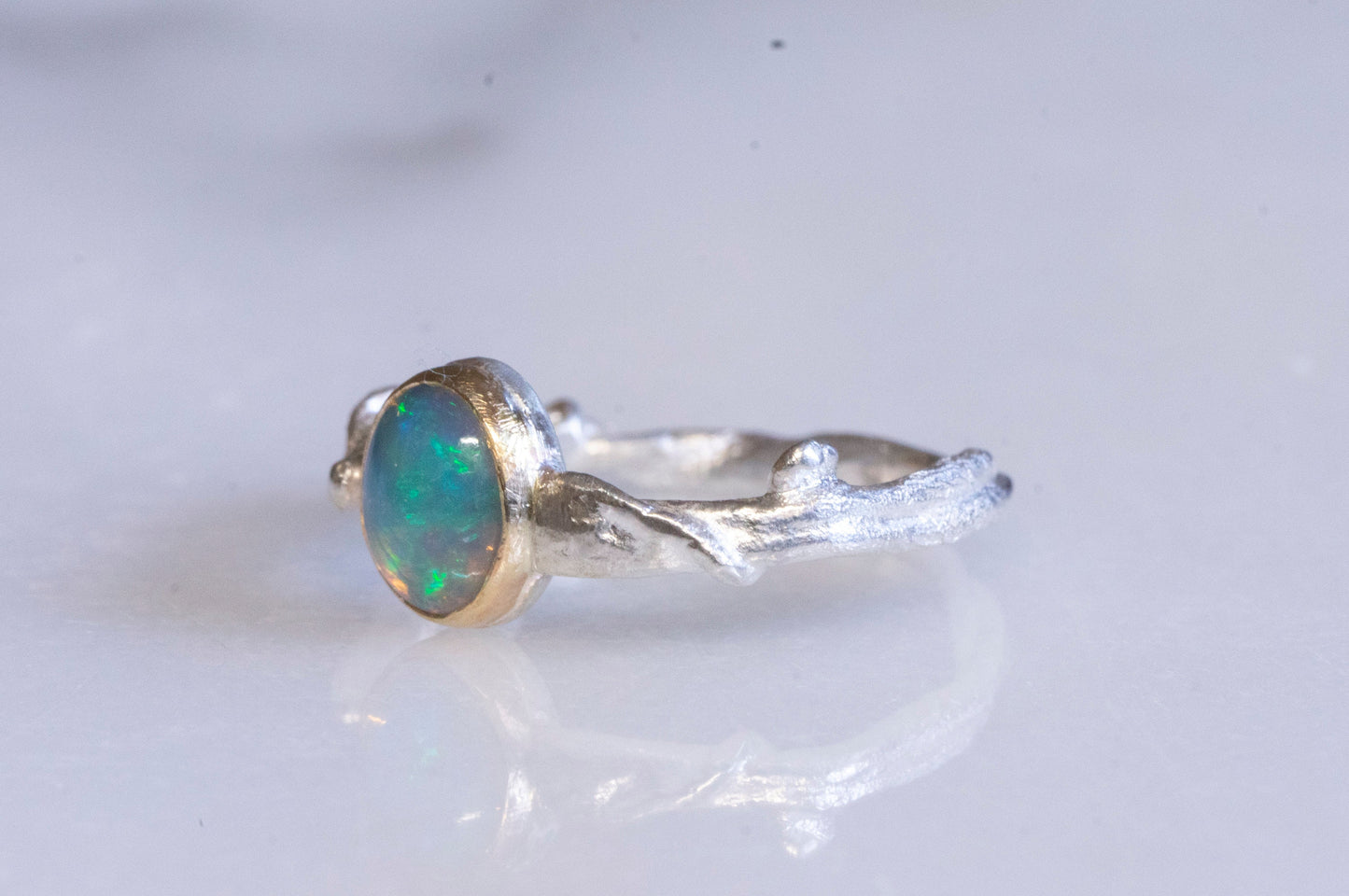 Ethiopian opal 14k gold and sterling silver twig ring