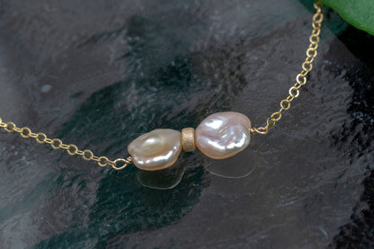 Bowtie petal pearl necklace