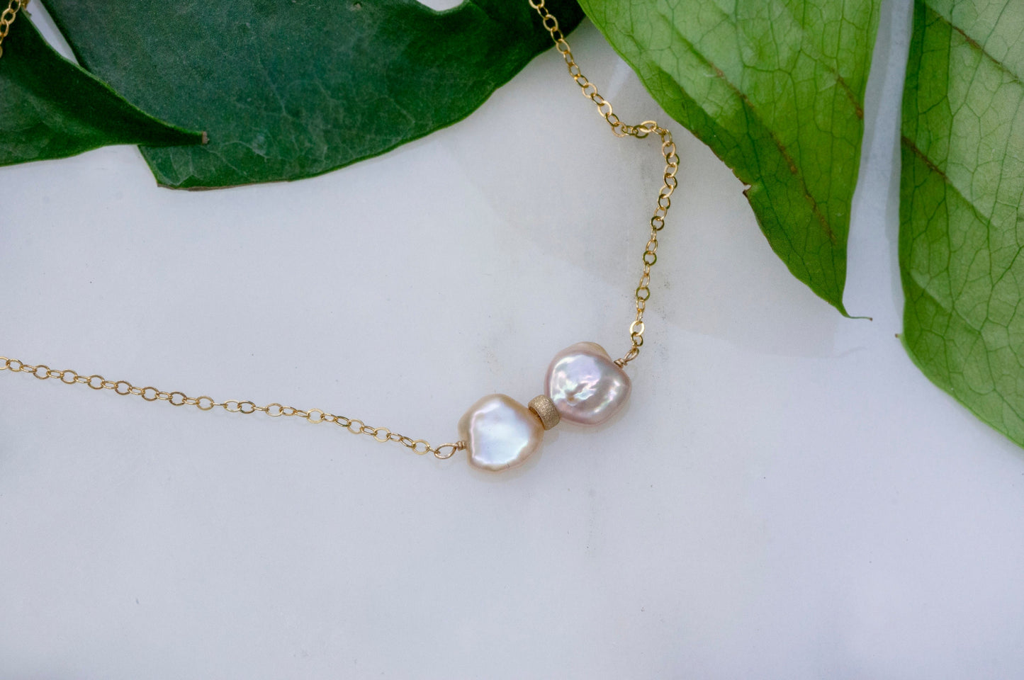 Bowtie petal pearl necklace