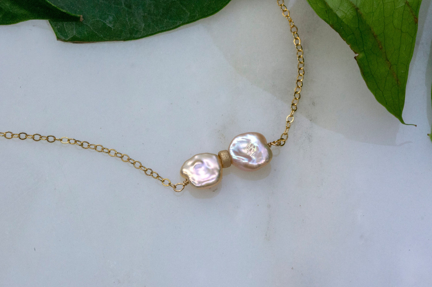 Bowtie petal pearl necklace