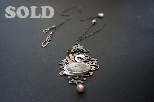Swan black fossil coral and baroque pearl sterling silver necklace